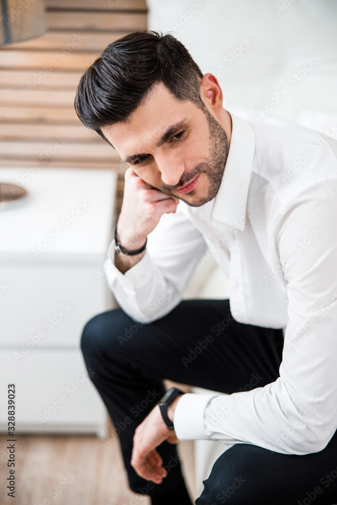 Happy young businessman at home stock photo Happy young businessman at home stock photo