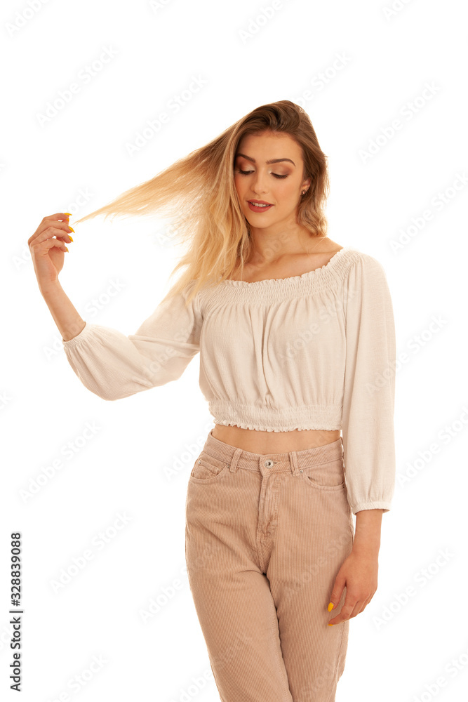 Beautiful young happy woman stands over white background gesture strong hair Beautiful young happy woman stands over white background gesture strong hair