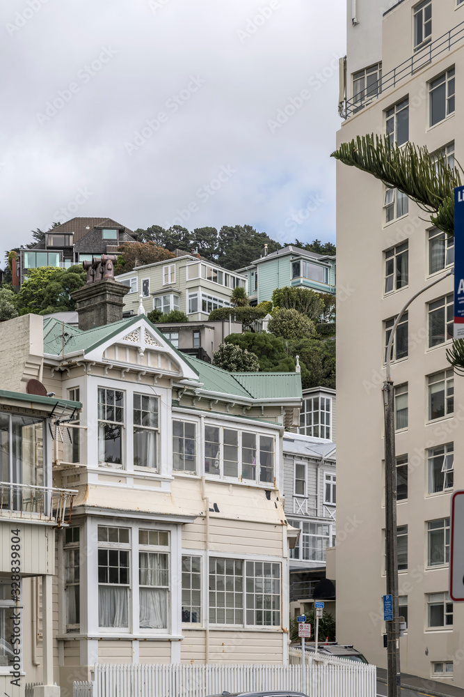 Fototapeta premium picturesque traditional Victorian house with bay window at Oriental parade neighborhood, Wellington, New Zealand