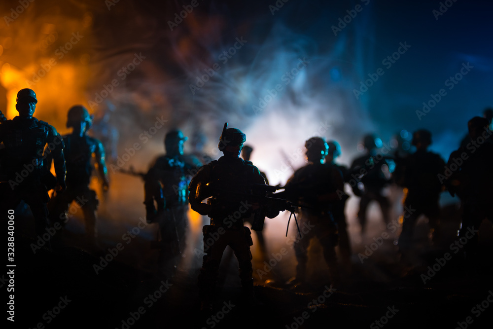 War Concept. Military silhouettes fighting scene on war fog sky background, World War Soldiers Silhouette Below Cloudy Skyline At night.