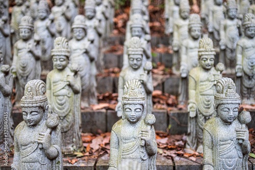 Rows of small carved religious statutes