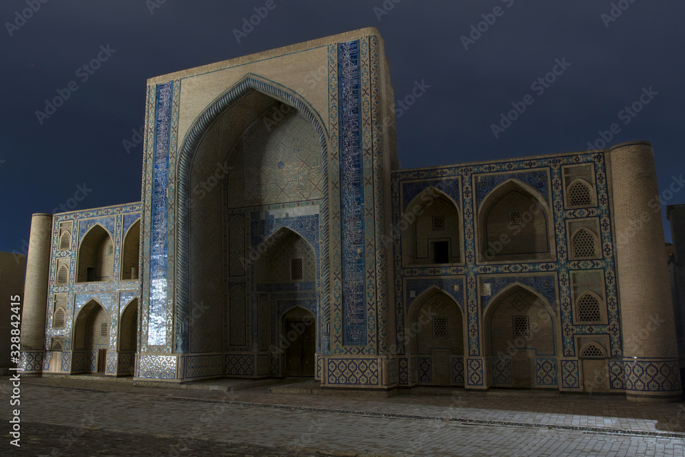 Ulugbek Madrasah at night. Bukhara, Uzbekistan, Central Asia.