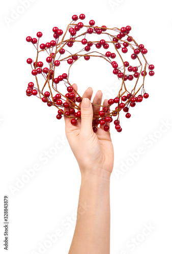 Red berry wreath, holiday decoration.