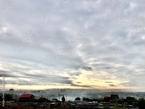 panorama of city with blue sky and clouds