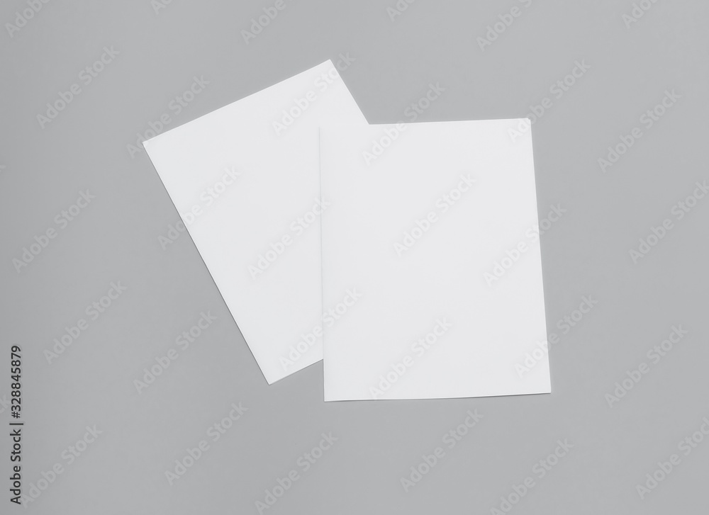Blank portrait A4. Mock-ups white paper isolated on gray background. can use banners magazine products business texture newspaper. Blank portrait A4. Mock-ups white paper isolated on gray background. can use banners magazine products business texture newspaper.