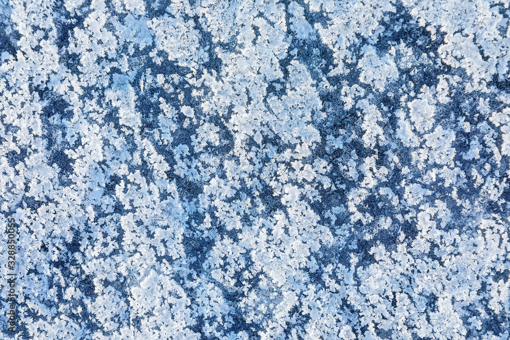 Texture of ice on the frozen lake. Blue color background. Texture of ice on the frozen lake. Blue color background.