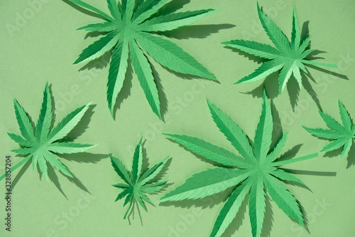 Wallpaper Mural Cannabis leaf made of paper on green background Torontodigital.ca