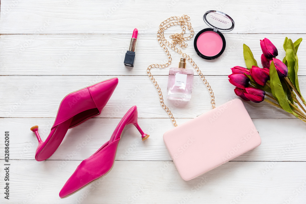 Fashion bag and shoe woman accessories background. Trendy fashion luxury handbag, heels perfume and cosmetic design with pink tulip flower. Lifestyle and Beauty Concept Stock-foto | Adobe Stock
