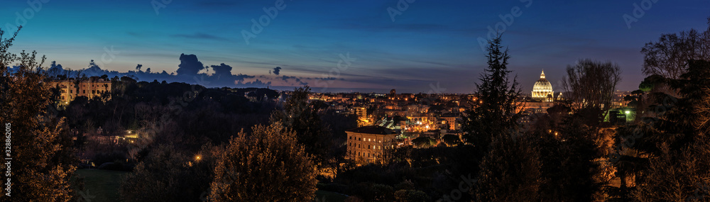 Skyline Night panorama of Vatican and Rome taken from the Gianicolo hill during blue hour
