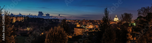 Skyline Night panorama of Vatican and Rome taken from the Gianicolo hill during blue hour