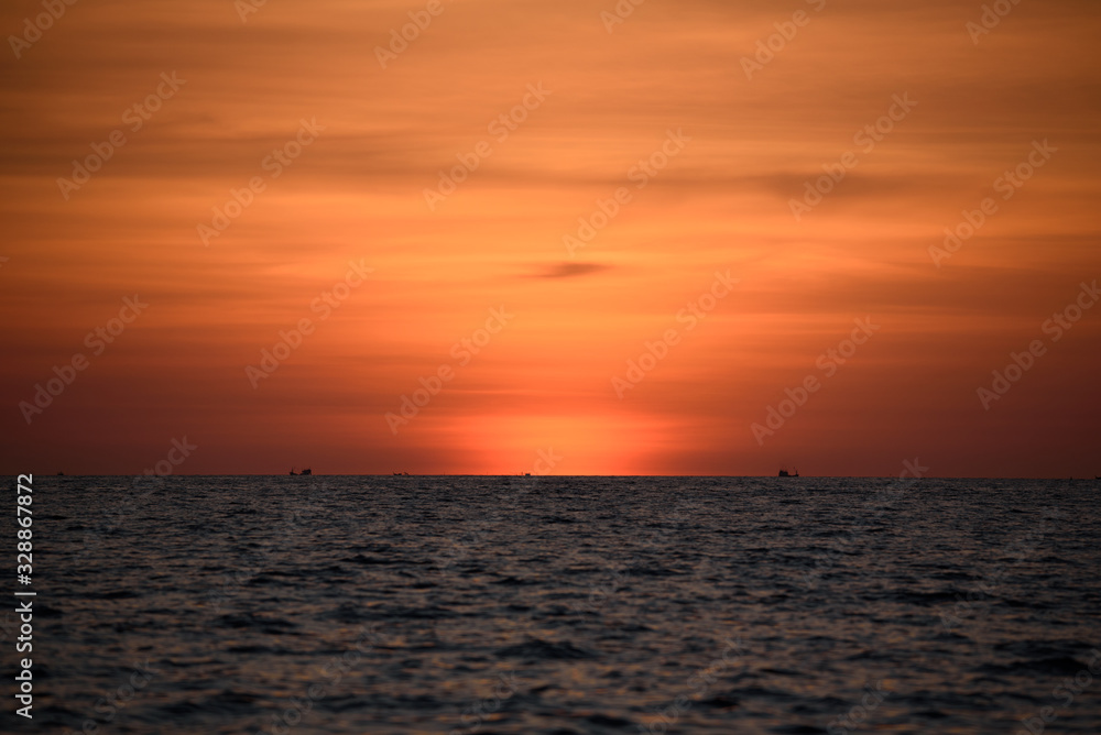 Beautiful orange sky and sea after sunset