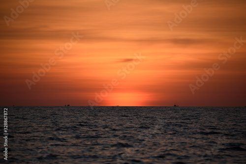 Beautiful orange sky and sea after sunset