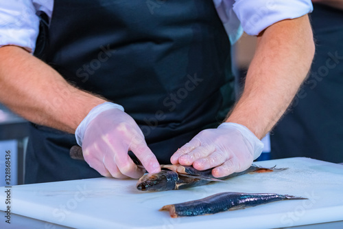 Hands cook, butchering herr...