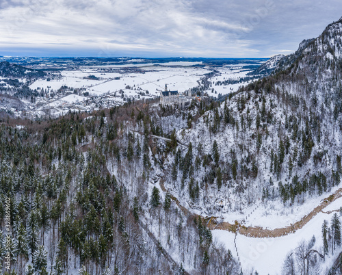 Aerial panorama of royal castle Neuschwanstein in Bavaria, Germany (Deutschland). The famous Bavarian place sign at winter day, Image of the huge size