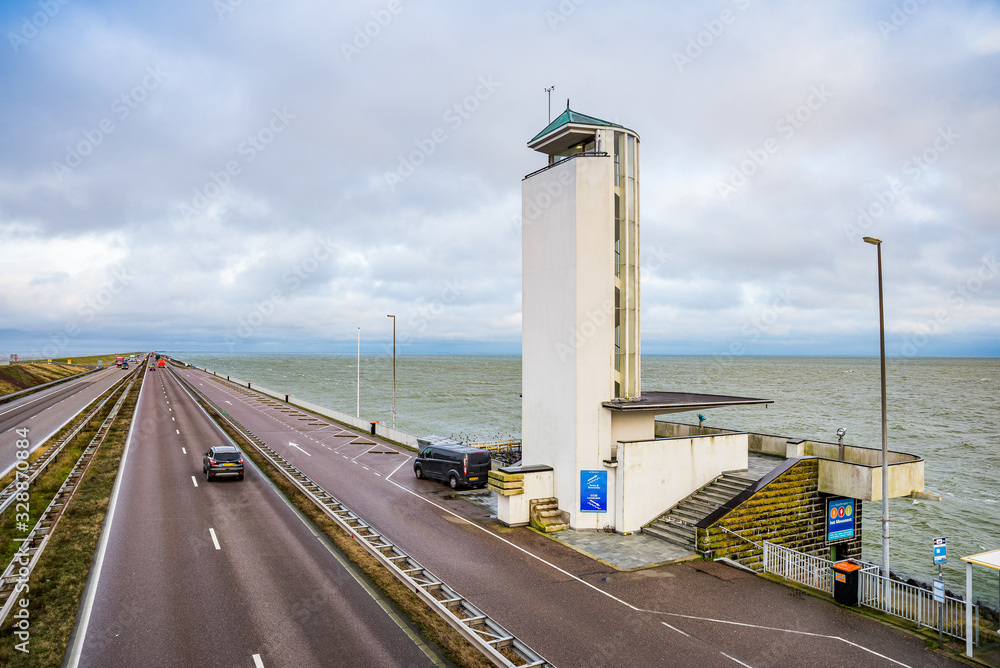 Den Oever, Netherlands - January 09, 2020. Lookout tower Vlietermonument by the road A7 Den Oever, Netherlands - January 09, 2020. Lookout tower Vlietermonument by the road A7