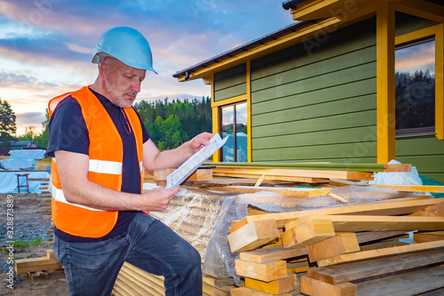 A man in a hard hat and an ...