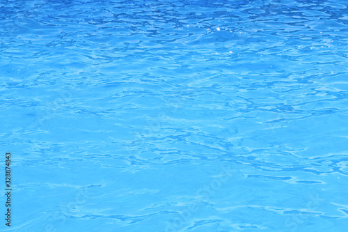 Blue Water Background. Water surface texture. Blue water ripple surface