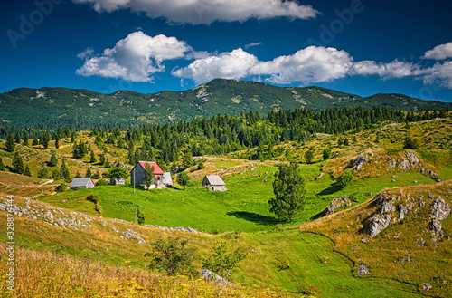 Nice village with wooden houses in the mountains of Montenegro