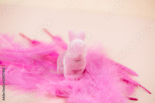 pink easter bunny on pink feather