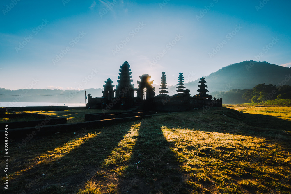 Sacred Balinese Temple of Tamblingan Lake on a misty morning