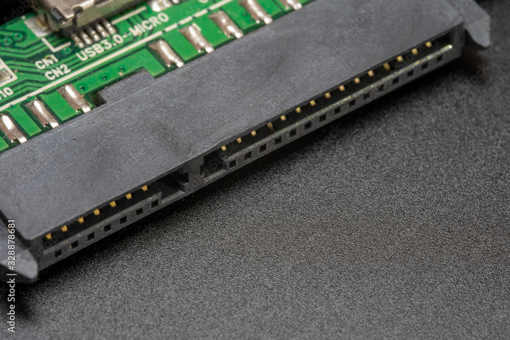 Sata hard drive connector on a black background Sata hard drive connector on a black background