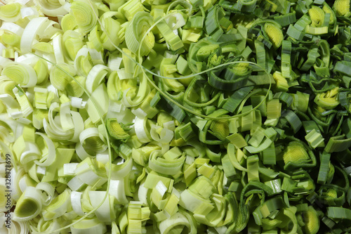 Photography of thinly sliced leek from white to green for food background