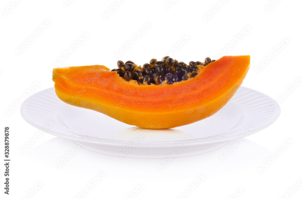 Papaya fruits on plate isolated on white background. Papaya fruits on plate isolated on white background.
