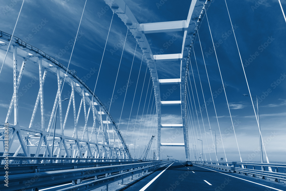 Obraz premium the Car rides on the road bridge connecting the banks of the Kerch Strait between Taman And Kerch