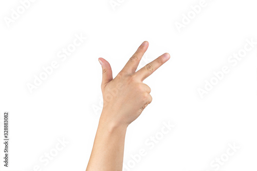 Asian back hand shows and counts 8 (eight) sign on finger on isolated white background. Clipping path