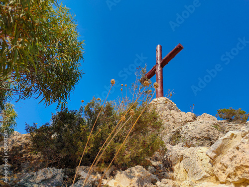 Big wooden cross over Agios Epiphanios church