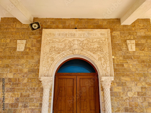 Exterior of main portal of Agios Epiphanios church photo