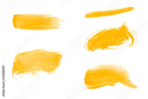 Set of beautiful yellow paint brushes for painting