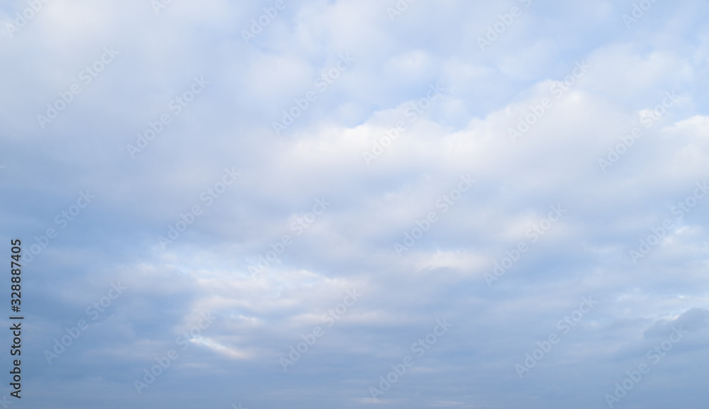 The sky covered by white clouds