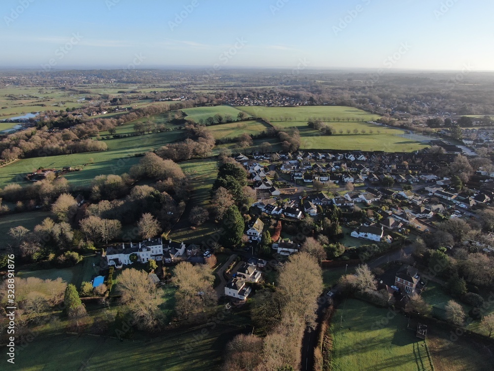 And aerial view of a small town set amongst the rolling countryside of Dorset