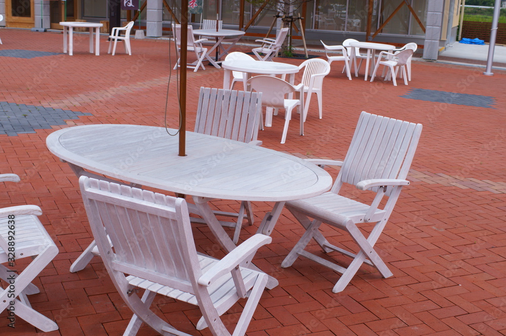 Tables and seats outside the cafe Tables and seats outside the cafe