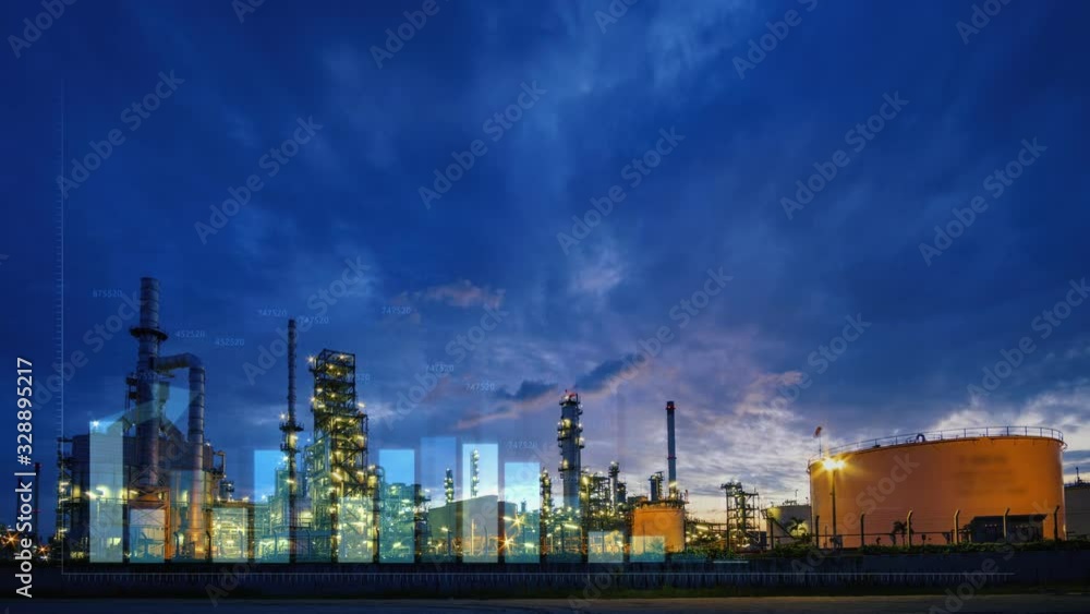 Double exposure of financial graphs rising in front of At The Refinery. Industrial Constructions At The Factory. Double exposure of financial graphs rising in front of At The Refinery. Industrial Constructions At The Factory.