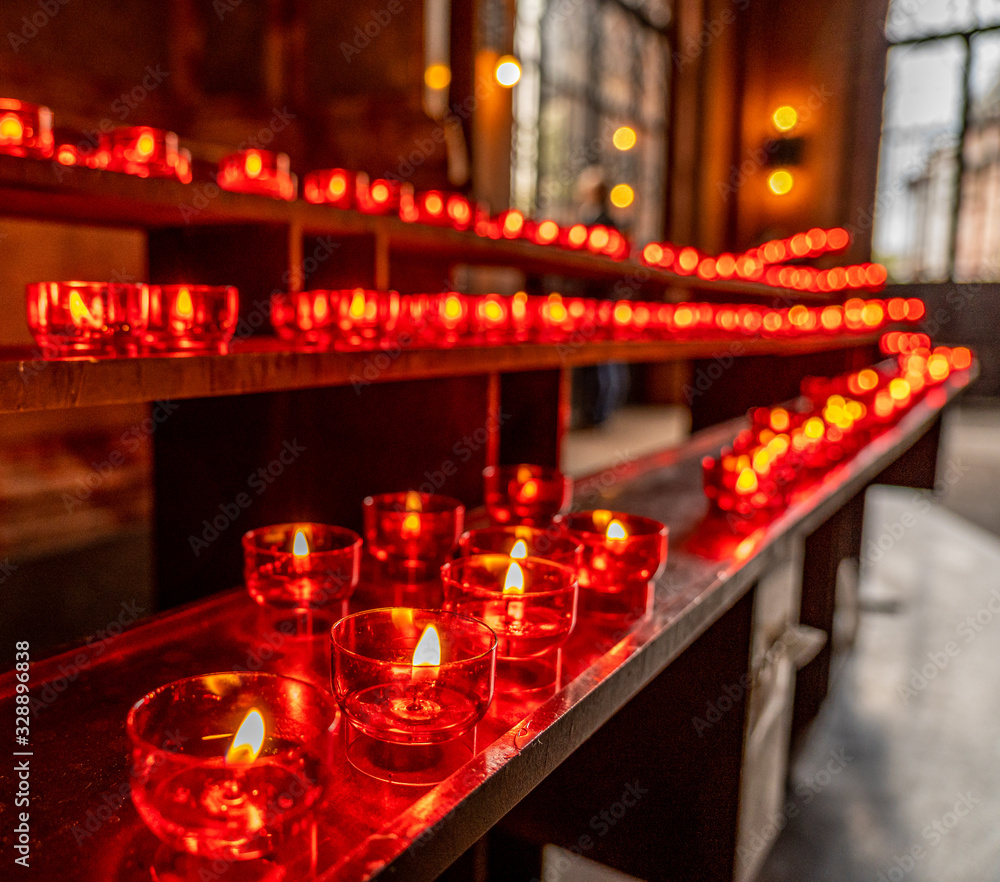red candles in Frankfurt dom church, germany