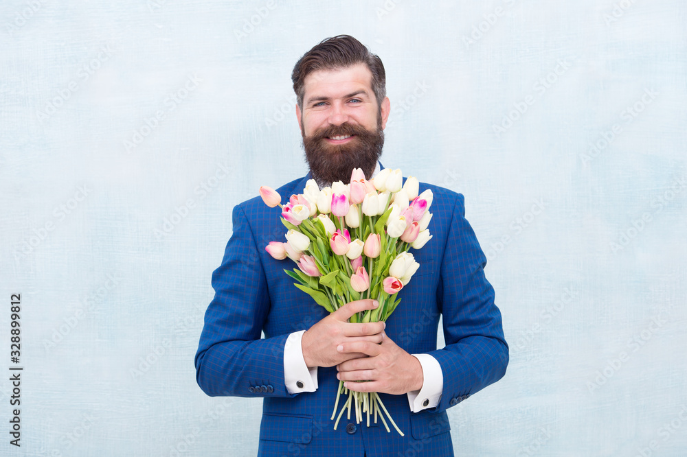Let me invite you. Bearded man with tulip bouquet. Love date. Womens day. March 8. Spring gift. Bearded man with flowers. Celebrate spring. Gentleman with tulips. Spring is coming. Romantic date Let me invite you. Bearded man with tulip bouquet. Love date. Womens day. March 8. Spring gift. Bearded man with flowers. Celebrate spring. Gentleman with tulips. Spring is coming. Romantic date