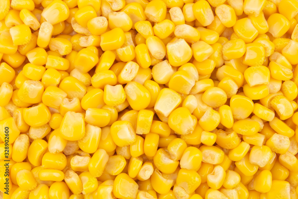 Canned corn background, preserved seeds of sweetcorn close up Canned corn background, preserved seeds of sweetcorn close up
