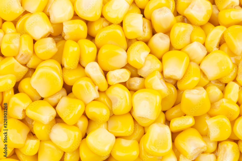 Canned corn background, preserved seeds of sweetcorn close up Canned corn background, preserved seeds of sweetcorn close up