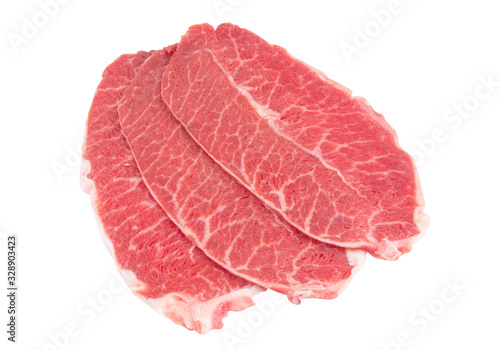 Raw beef meat slices isolated on white background