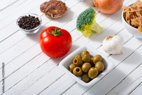 mediterranean food ingredients on white wooden