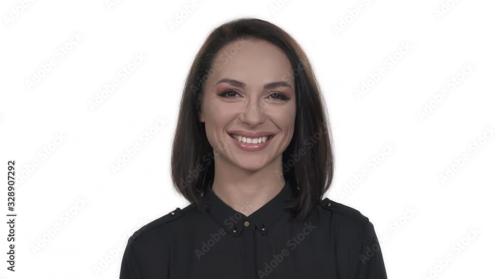 Close-up portrait shot of happy smiling Caucasian woman looking at camera, isolated on white background Close-up portrait shot of happy smiling Caucasian woman looking at camera, isolated on white background