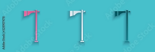 Paper cut Native american tomahawk axe icon isolated on blue background. Paper art style. Vector Illustration