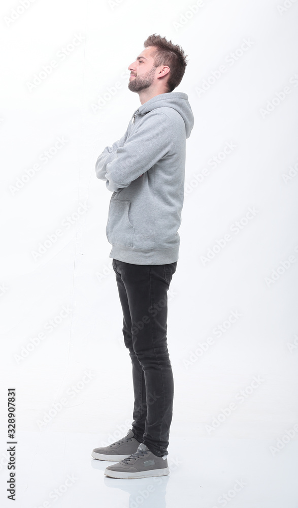 Fototapeta premium side view . casual man looking at copy space . isolated on white