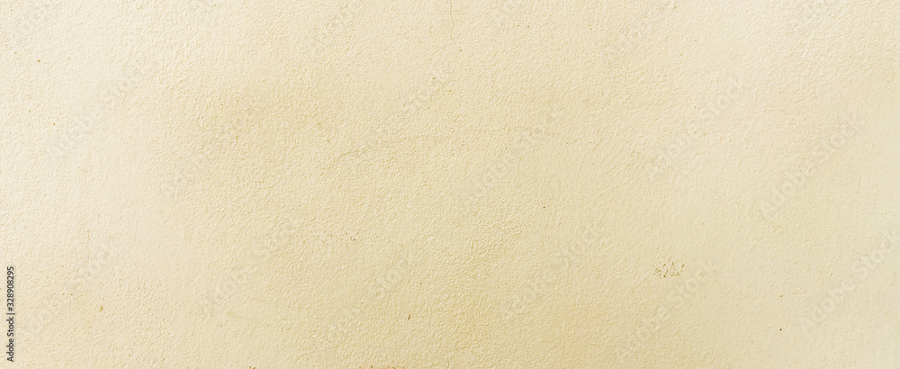 Fototapeta close up retro plain cream color cement wall panoramic background texture for show or advertise or promote product and content on display and web design element concept