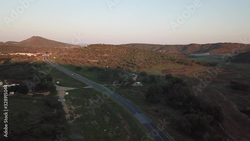 4K aerial drone video view of historical railway bridge on main B6 road from Windhoek to Gobabis and Windhoek Hosea Kutako Airport in central highland Khomas Hochland of Namibia, southern Africa photo