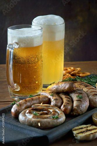 grilled sausages with a glass of beer