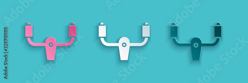 Paper cut Aircraft steering helm icon isolated on blue background. Aircraft control wheel. Paper art style. Vector Illustration