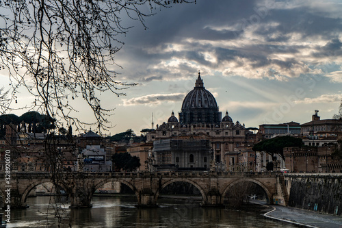 The Papal Basilica of St. Peter, west of River Tiber in Rome, Italy cloud day